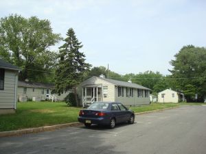 Empty on-street parking spaces are a common site at Butler Apartments. Graduate students work nearby, and don't use cars much.
