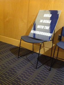 A placard protesting the AvalonBay Apartment plan at the Princeton hospital site, from a demonstration held outside the Planning Board meeting in June. Remaining objectors had a rough night on Thursday, as the proposal was approved with variances. (Click to expand.)