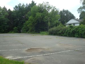 Behind the green hoarding: what the Campus Town looks like today. (Click to expand)