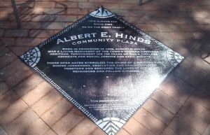 The new memorial to Albert E. Hinds at Hinds Plaza. The text reads: "