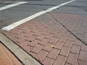 A 'stamped asphalt' crosswalk kinda looks like brick, but isn't. (Click to expand)