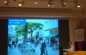 Gil Penalosa of 8-80 Cities addresses an enthusiastic audience at the kick-off event for New Brunswick's Ciclovia. (Click to expand.)