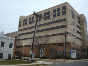 Despite ten years of planning to replace this hospital tower in Princeton, a new company fronted by Princeton residents wants more planning. (click to expand.)
