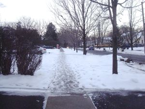 Un-shoveled sidewalks make for a treacherous surface for walkers. (Click to expand.)