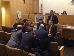 Josh Zinder (facing camera) confers with his team at Princeton Zoning Board Meeting (click to expand)